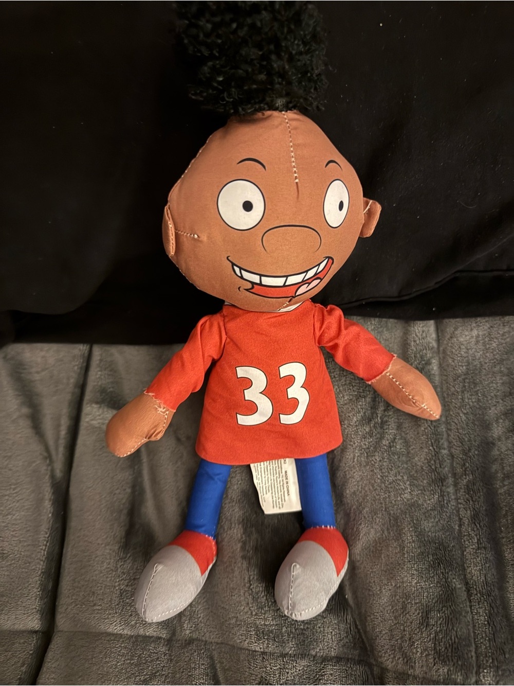 Plush Kids Doll in Brown with Red Jersey and Blue Pants